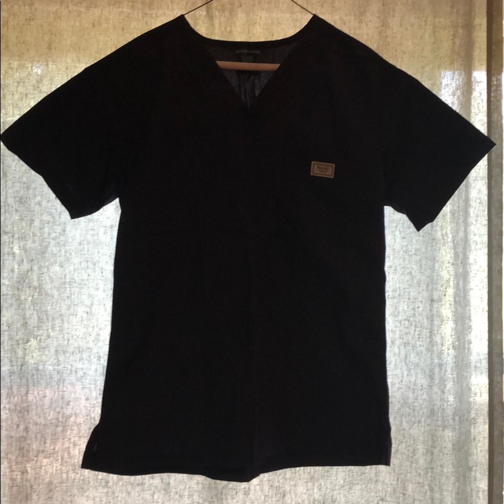 Blue Sky Scrub Top in Eggplant.
